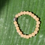 Peach agate Buddha head Braclets