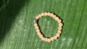 Peach agate Buddha head Braclets